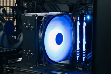 Computer fan. DDR4. Modern case cooling system. Air-cooled gaming PC with full ARGB lighting...