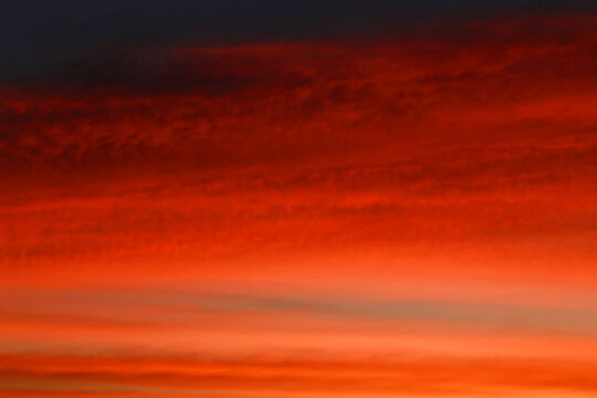 Abstract Dramatic red sky before at night. Sky sunset and clouds. picture backdrop design art work or text message.