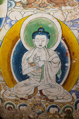 Mural of Buddha inside of a monastery in East Bhutan, Asia