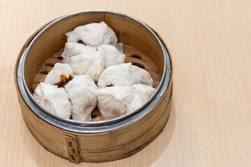Steamed Char Siew Bao or barbecue pork bun is favorite traditional Chinese dim sum, consumed as breakfast