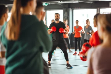 Poster coach leading a kickboxing routine in a gym setting © stickerside