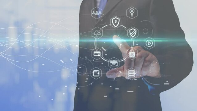 Cg footage on a light background. Cg footage of a male hand with a light point on his index finger from which light rays diverge and a circle with icons with symbols of the consumer society rotates.