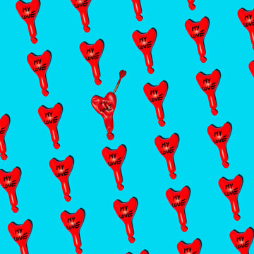 Inflated red balloons in light arranged in rows