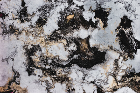 Elegant marble texture with gold accents - Powered by Adobe