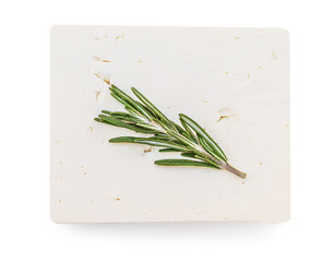 Feta cheese on isolated on white background, top view. Fesh Greek feta cheese block with rosemary herbs close up.