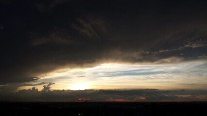 Fototapeta na wymiar Sunset in the clouds over Curitiba, Brazil