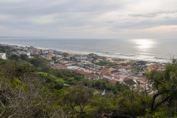 Fonte of Telha, a popular spot, known for its sandstone cliffs and fishermen, Costa of Caparica, Almada, Portugal