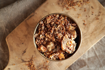Myrrh resin in a bowl - ingredient for aromatherapy essential oils