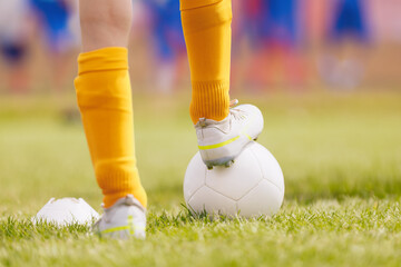 Soccer player in training. Children on the sports field. Football equipment at sports grass pitch....
