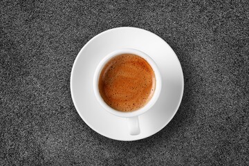 White cup for morning coffee on desk background,