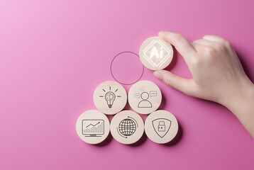 AI Artificial intelligence technology concept. Hand placed AI chip wooden block on background. AI...