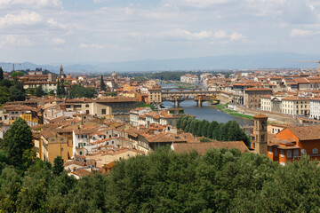 Fototapeta na wymiar Panoramic view of the picturesque city of Florence with the Ponte Vecchio bridge. Central Italy, Tuscany region