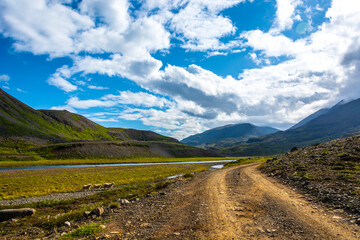 Beautiful summer landscape of Iceland. The road leading to the mountain lake.