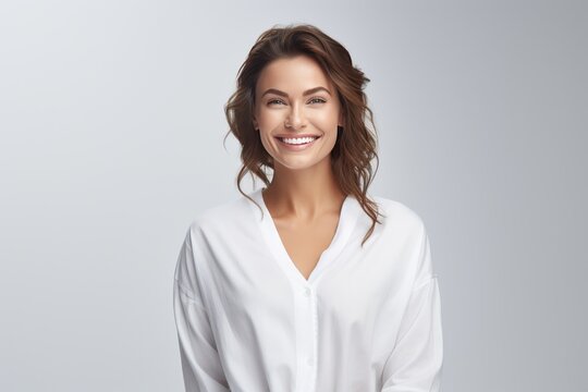 Caucasian woman, dressed in tranquil pajamas adorned with simple patterns, radiates a calm smile against the backdrop of a plain background setting. Generative AI.