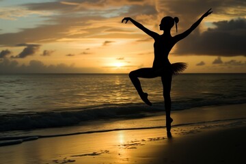 silhouette of ballerina en pointe on a beach at sunset