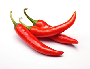 Fotobehang Three red chili peppers with stems on a white background, vibrant and glossy. © Sascha