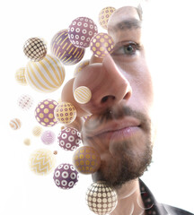 A double exposure close-up portrait of a young man combined with 3D spheres. - 729295929