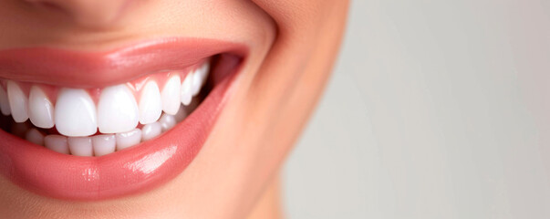 Obraz premium Beautiful female smile after teeth whitening procedure. Dental care. Dentistry concept.