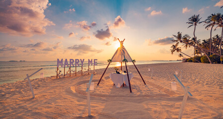 Love couple proposal romantic proposal on paradise beach in island Maldives. Panoramic sunset of...