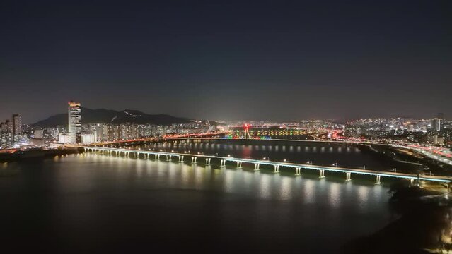 Han River at night Seoul glow bridge over water panoramic top view. Han River at night tradition and modernity Seoul's spirit alive Han River at night depth of Seoul's allure cityscape in harmony.