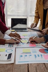 vertical business meeting Image Business team meeting using calculator Work with charts and analyze...