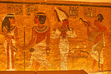sculptural details on the wall of the temple of the Tutankhamun king, Luxor, Egypt.Tomb of pharaoh Tutankhamun in Valley of the Kings, Luxor, Egypt