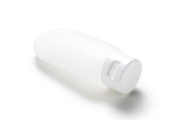 empty cosmetics dispensing bottle on white background