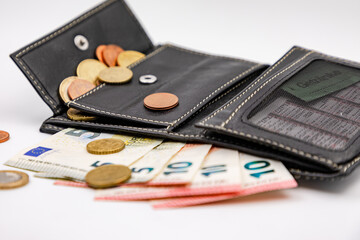 Euro change money with paper money and coins in your wallet