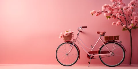 Deurstickers Bicycle with flowers on pink background © Rassamee