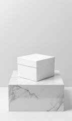 Mock up of white product box package, on a marble pedestal  