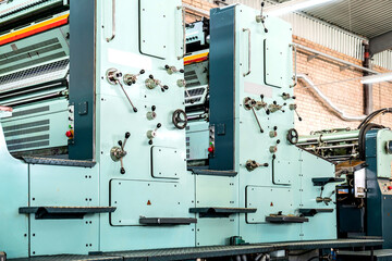 Press printing printshop Offset machine. Offset press is a printing machine designed to produce...
