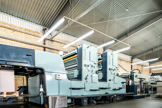Press printing printshop Offset machine. Offset press is a printing machine designed to produce fine quality reproductions.