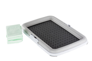 Dog traning pad or dog toilet isolated on white background © siavramova