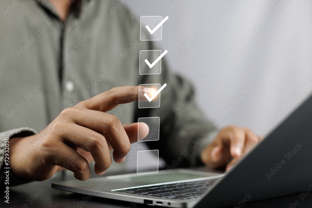 Canvas Prints business performance monitoring and evaluation concept, take an assessment, business man using lapto