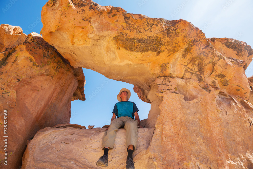 Wall mural Man on the cliff