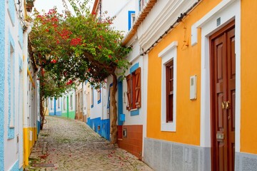 Fototapeta na wymiar Street of Ferragudo fisherman village, Algarve Portugal