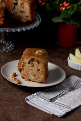 Vanilla Birthday Cake with Caramel Drizzle and Nut Toppings, Perfect for any celebration, this cake is adorned with a luscious caramel glaze, crunchy nuts, and sweet raisins