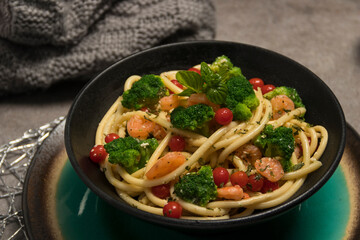 Nutritious and Delicious: A Plate of Pasta with Broccoli and Cherry Tomatoes
