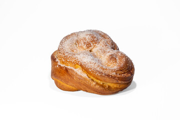 Sweet bun on a white background. Plushka bun from Berdyansk bakery