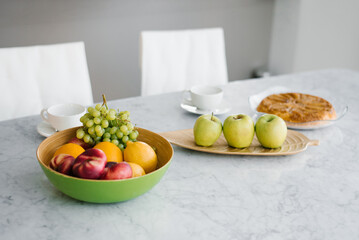 Plate of ripe fruits on a table