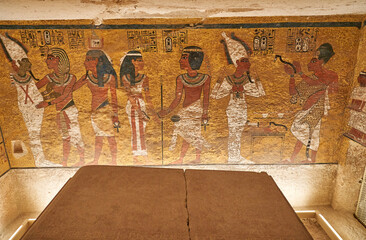 sculptural details on the wall of the temple of the Tutankhamun king, Luxor, Egypt.Tomb of pharaoh Tutankhamun in Valley of the Kings, Luxor, Egypt