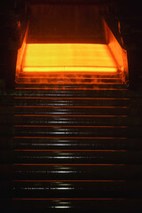 Hot steel plate on conveyor - 729337926