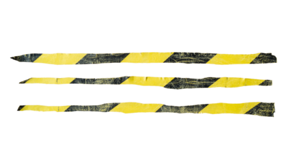 Torn old yellow and black barricade tape