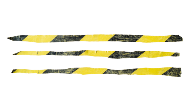 Torn old yellow and black barricade tape