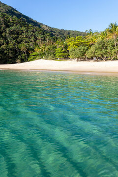 Praia dos Meros, one of the most beautiful beaches in Brazil, during a beautiful day of sunshine and clear waters. Ilha Grande, Angra dos Reis, Rio de Janeiro, Brazil.