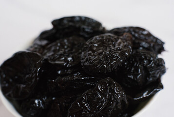 Juicy ripe prunes close-up