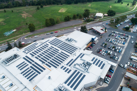 Roof of shopping center covered in solar panels