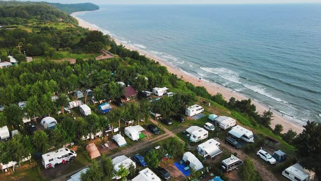 Aerial view of campsite with trailers near Baltic sea beach in Wladyslawowo, Poland. Tourists have rest during summer vacation season