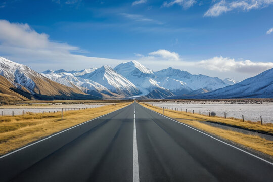 road by new zealand mountains with snow.