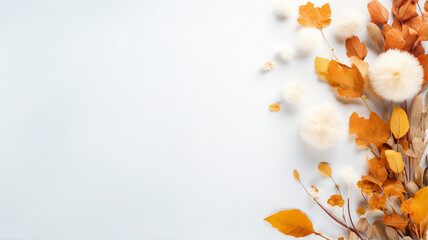 Fall leaves and fluffy decorations on a white background